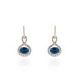 Earrings with horizontal sapphire